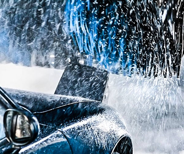 Vehicle going through car wash