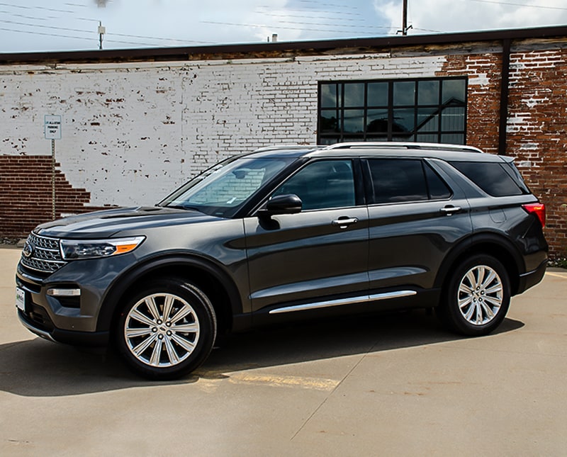 2020 Ford Explorer Side Exterior parked next to brick building