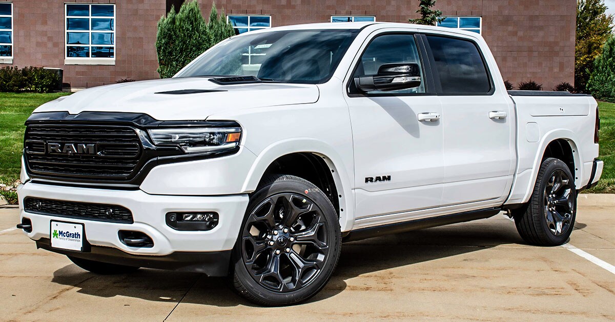 2021 Ram 1500 side exterior parked outside next to building