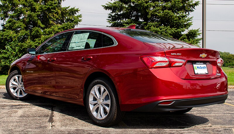 2019 Cajun Red Chevy Malibu LT rear exterior parked in a lot