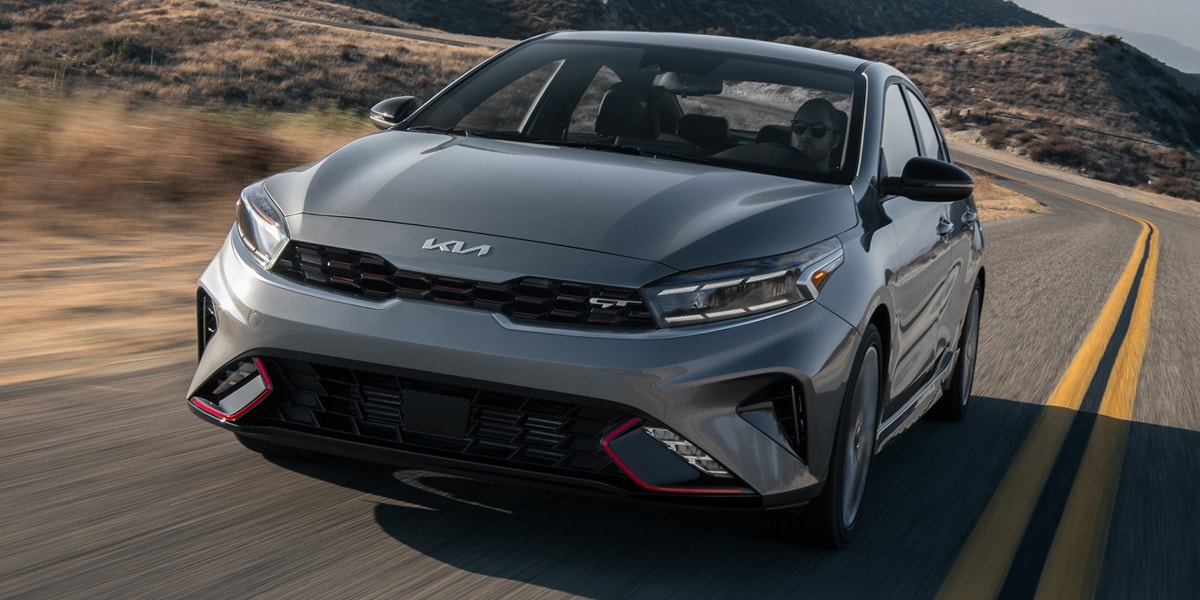 2024 Kia Forte driving down road