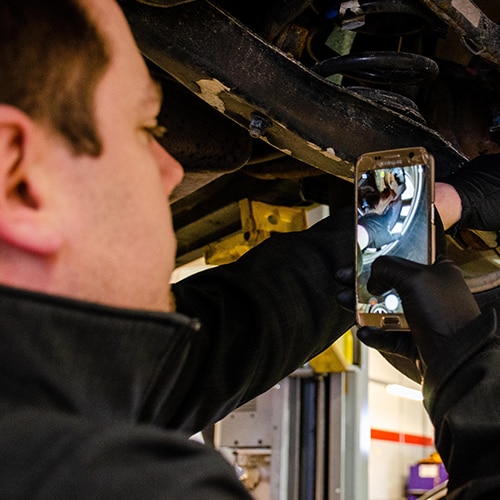 Service Tech with Phone