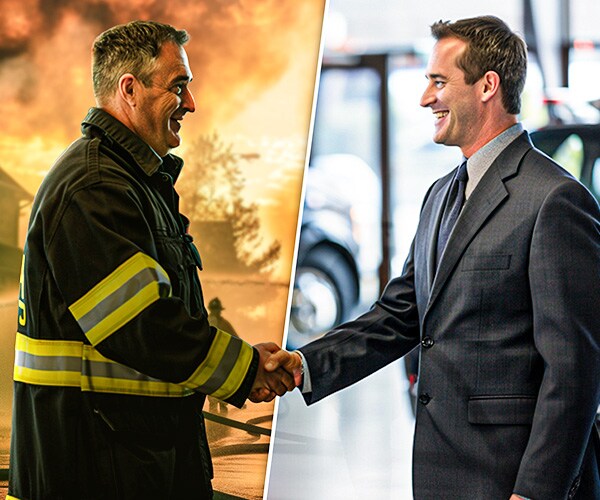 firemen shaking the hand of a sales consultant