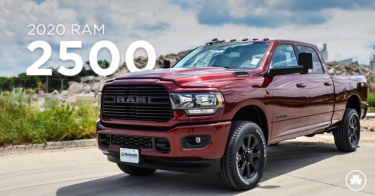 2020 Ram 2500 driving on the road through the mountains