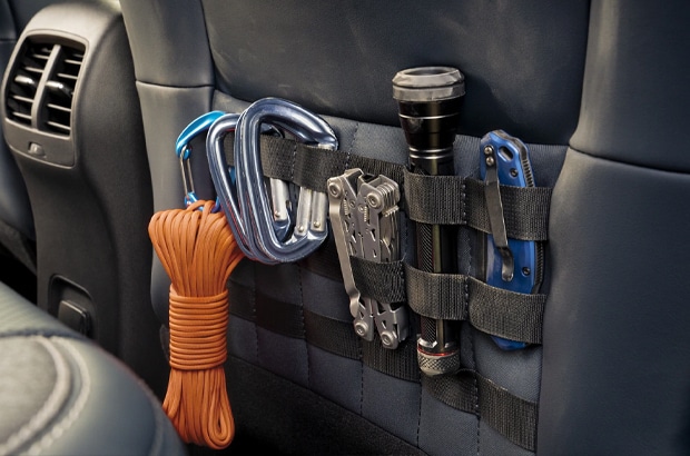 Unique MOLLE seatback storage system