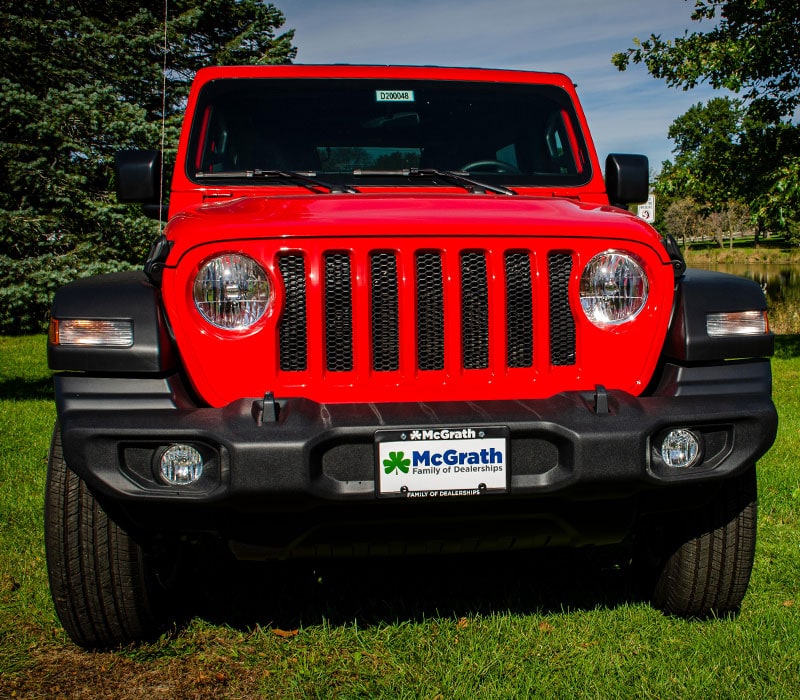 2020 Red Jeep Wrangler Exterior front view parked in a park