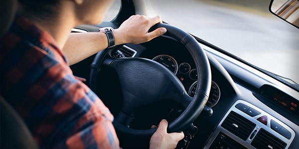 Teen test driving car
