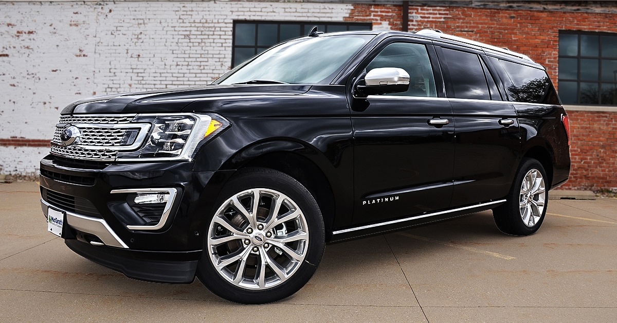 2019 Black Ford Expedition exterior parked next to brick building