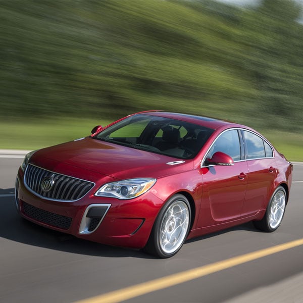 Red 2016 Buick Regal driving down the highway