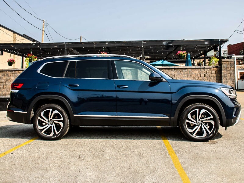 2021 Volkswagen Atlas profile parked next to building