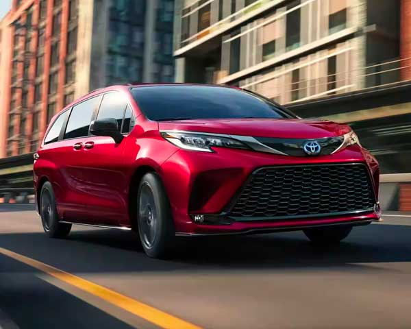 toyota sienna driving down the road