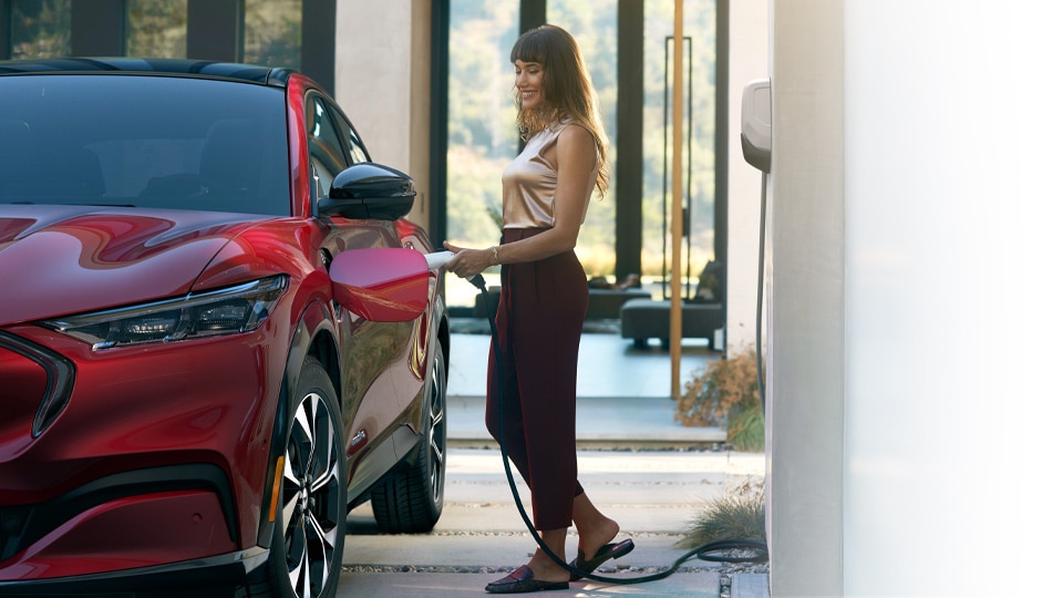Girl charging the Mach E