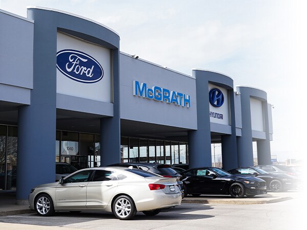 Mcgrath Ford front of the dealership with inventory out front