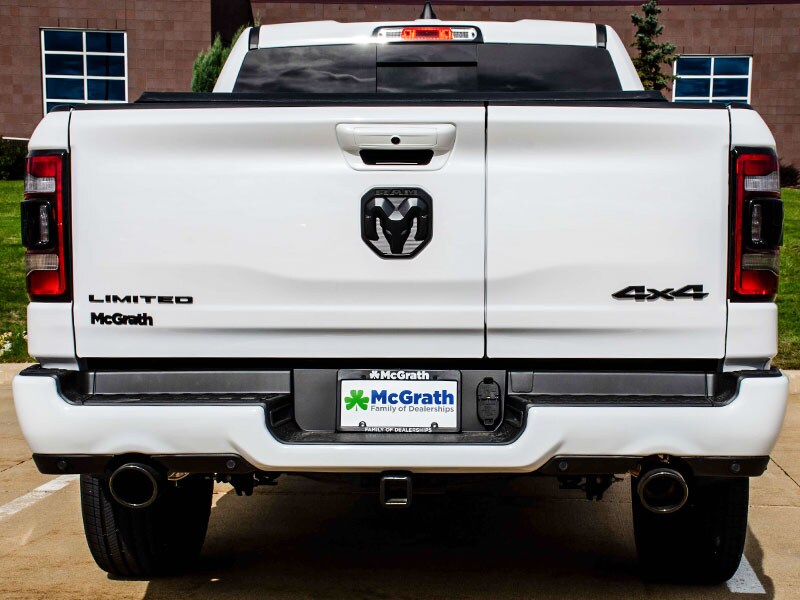 2021 Ram 1500 rear tailgate parked next to building 