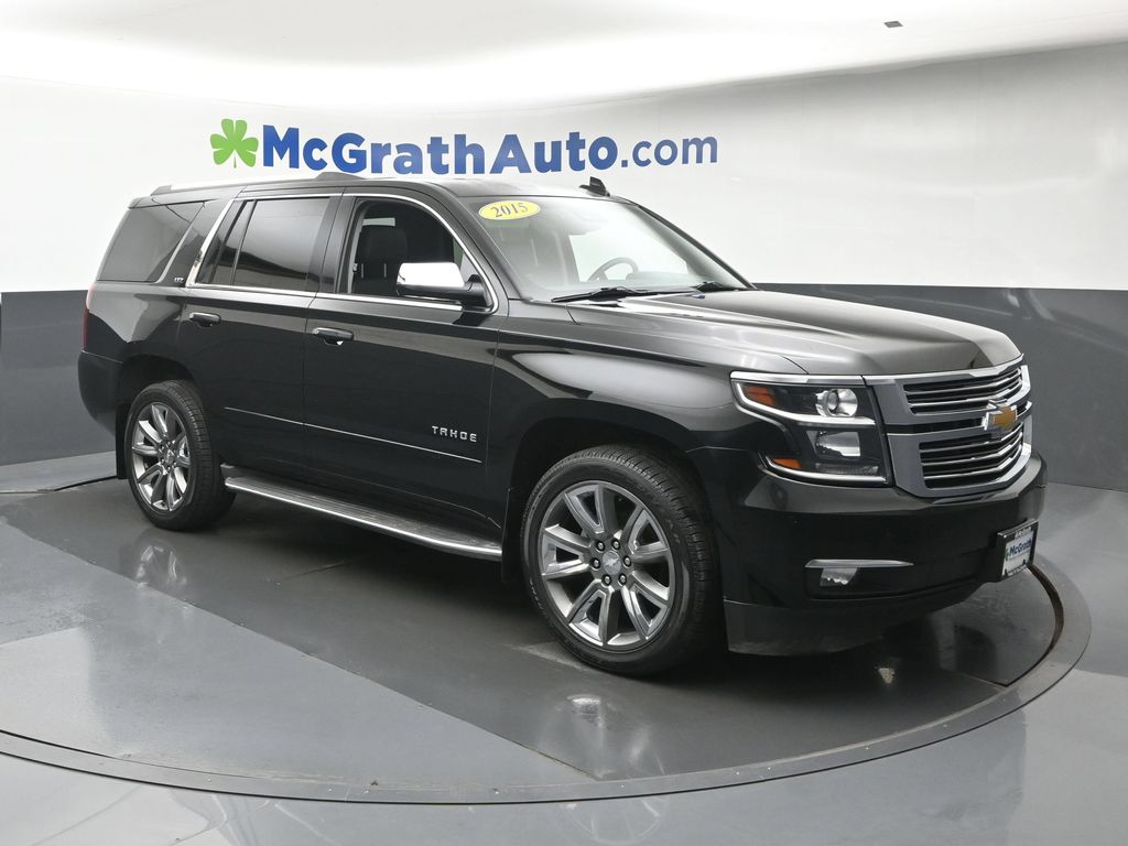 Used 2015 Chevrolet Tahoe LTZ with VIN 1GNSKCKC6FR666870 for sale in Hiawatha, IA