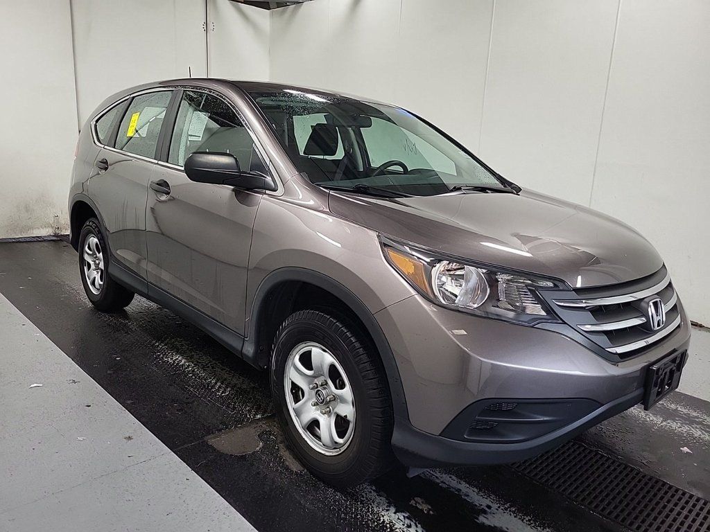 Used 2013 Honda CR-V LX with VIN 5J6RM4H34DL072612 for sale in Hiawatha, IA