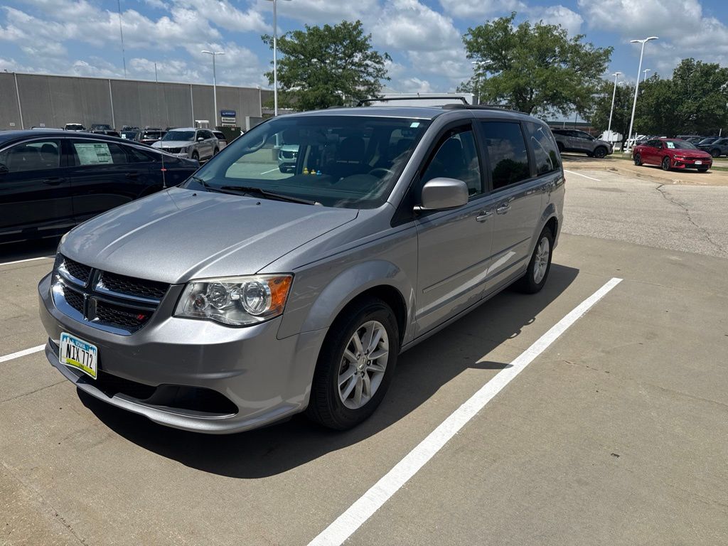 Used 2014 Dodge Grand Caravan SXT with VIN 2C4RDGCG1ER476848 for sale in Hiawatha, IA
