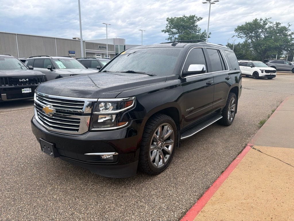Used 2015 Chevrolet Tahoe LTZ with VIN 1GNSKCKC6FR666870 for sale in Hiawatha, IA