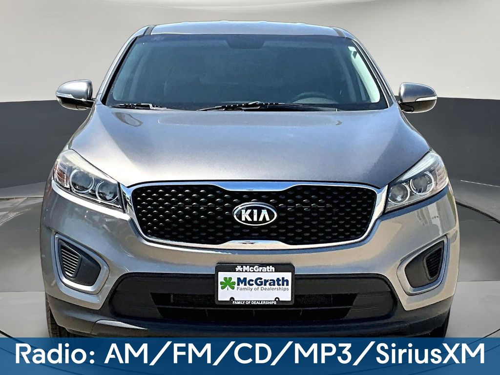 Used 2016 Kia Sorento L with VIN 5XYPG4A32GG004047 for sale in Dubuque, IA