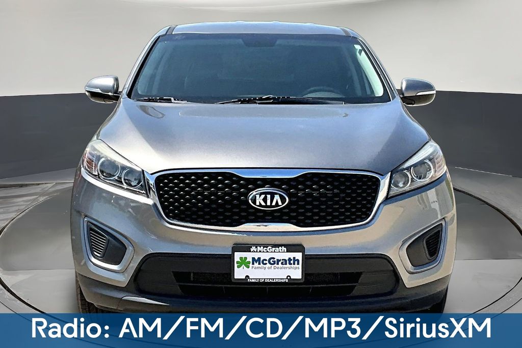 Used 2016 Kia Sorento L with VIN 5XYPG4A32GG004047 for sale in Dubuque, IA