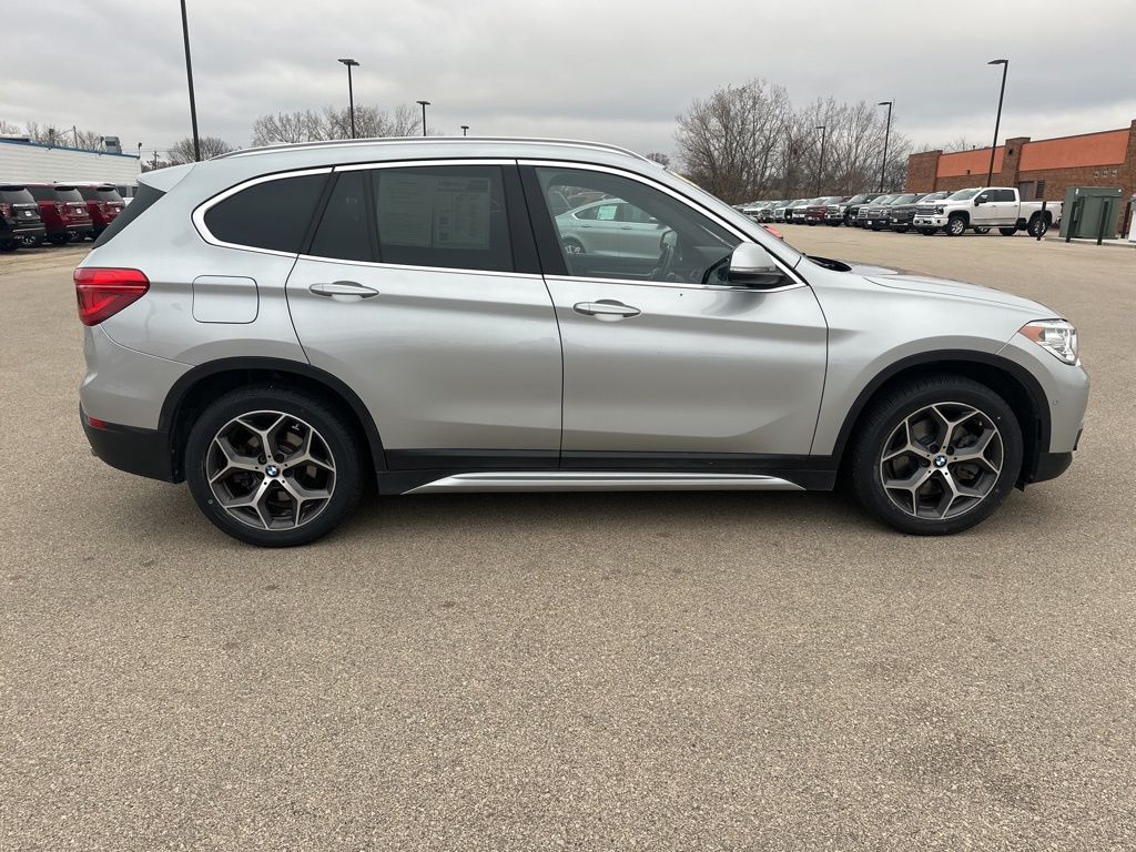 Used 2019 BMW X1 28i with VIN WBXHT3C54K3H36515 for sale in Dubuque, IA