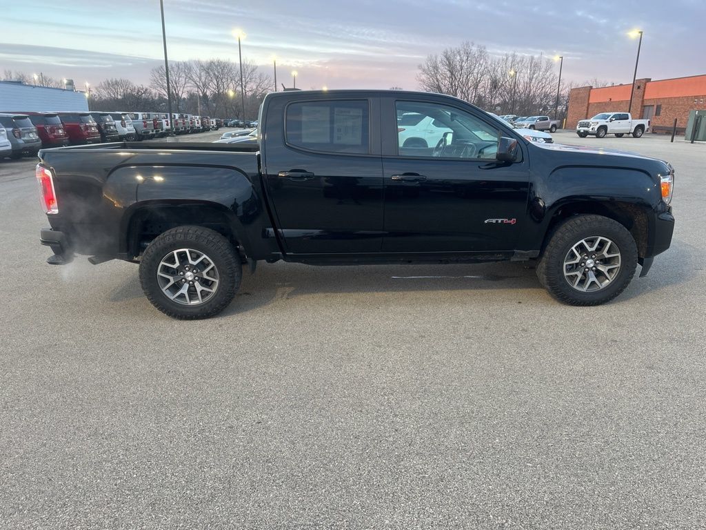 Used 2021 GMC Canyon AT4 with VIN 1GTG6FEN3M1275902 for sale in Dubuque, IA
