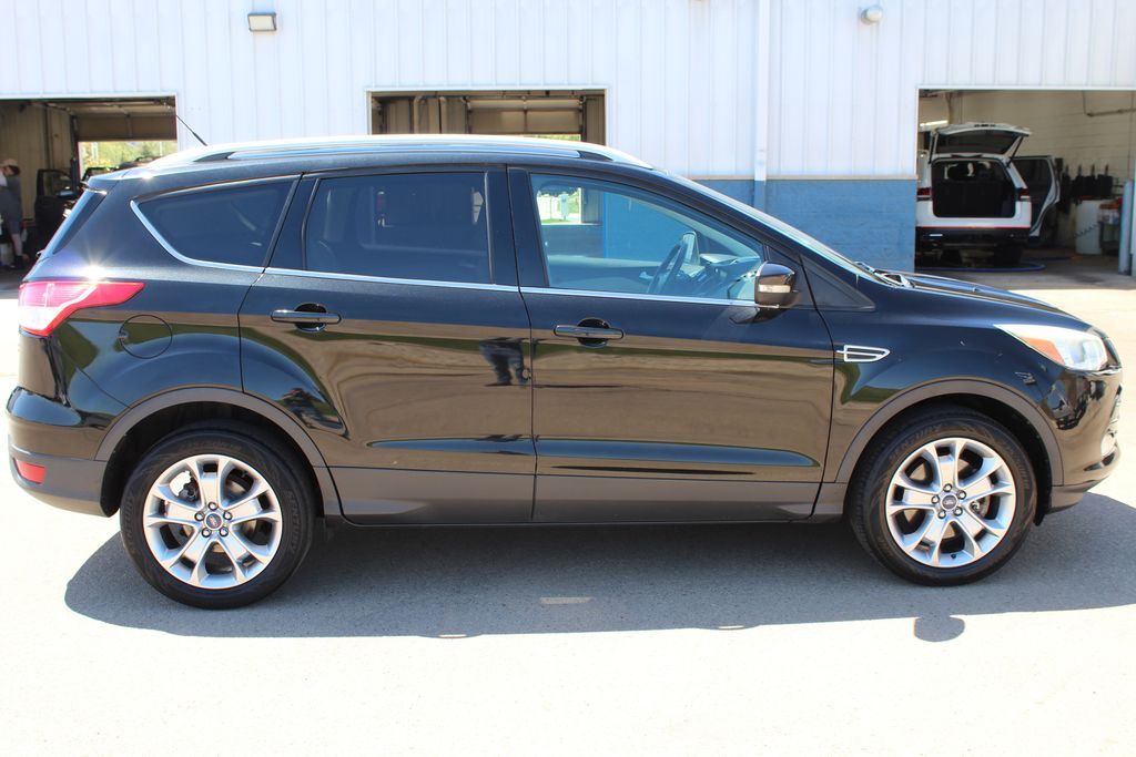 Used 2014 Ford Escape Titanium with VIN 1FMCU9J91EUA98633 for sale in Dubuque, IA