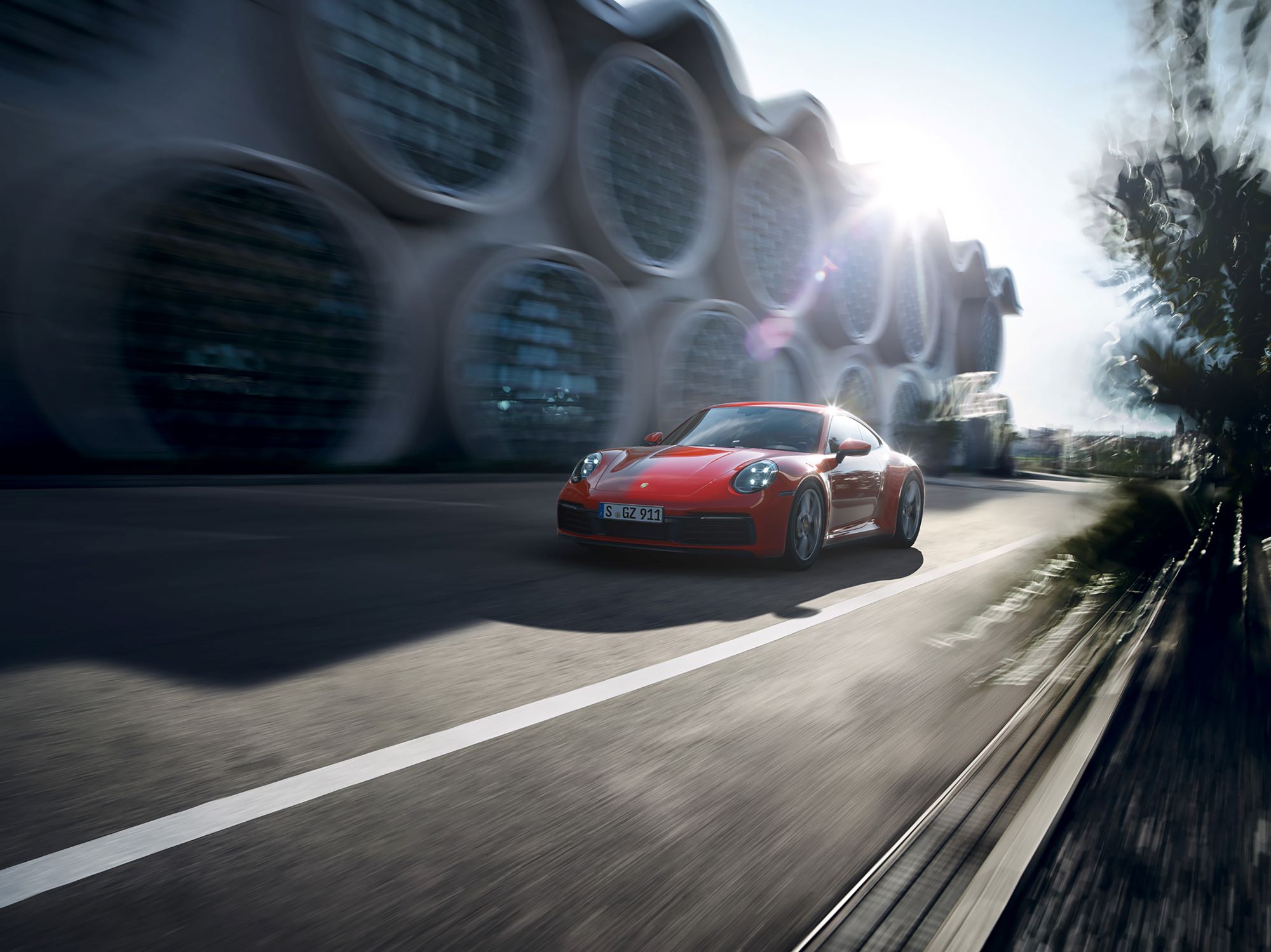  Person cheerfully signing documents.