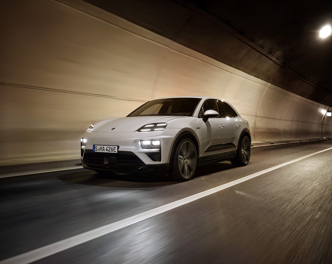  Person cheerfully signing documents.