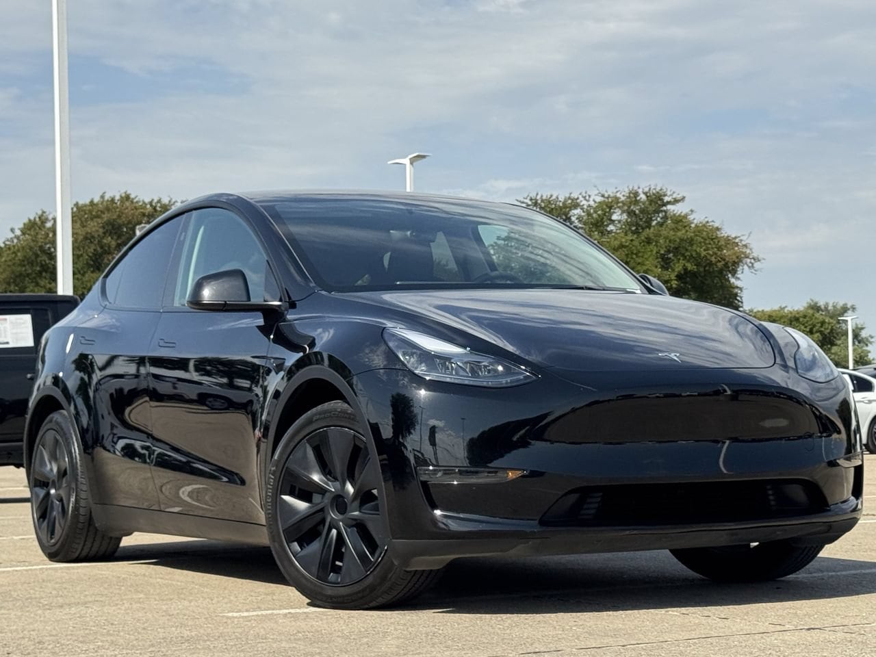 Used 2025 Tesla Model Y Long Range with VIN 7SAYGDED5SA373055 for sale in Mckinney, TX
