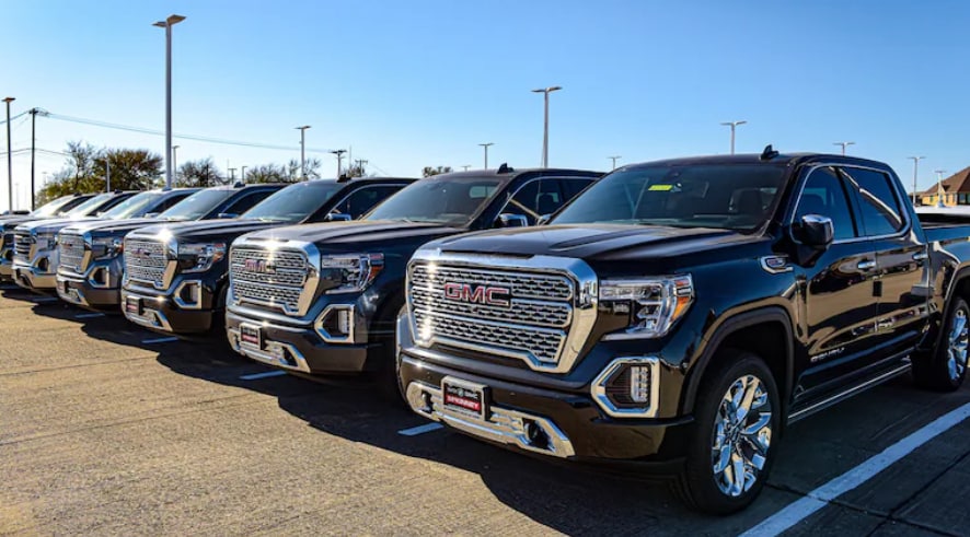 A row of GMC trucks