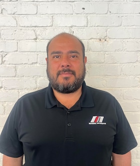 Staff member Andres Pachon from ID_fb70083ec928