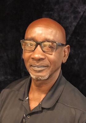 Staff member Olen Gulley from a2dcae46a9ad