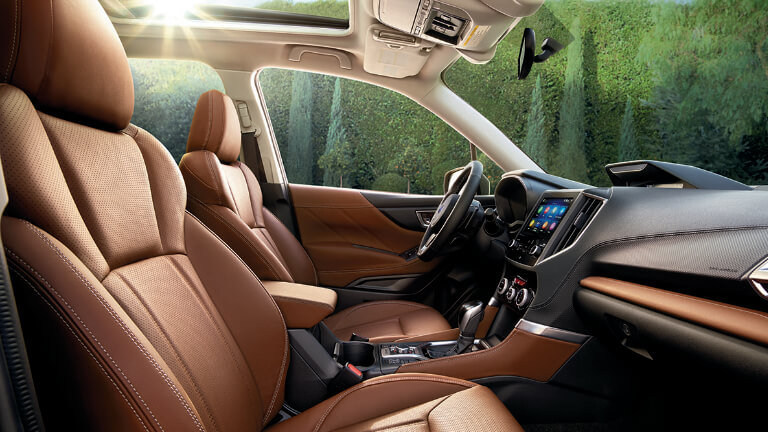 2020 Subaru Forester interior in brown showing two front seats view from passanger side