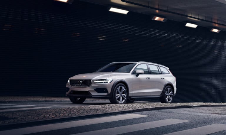 Silver Volvo driving in a tunnel