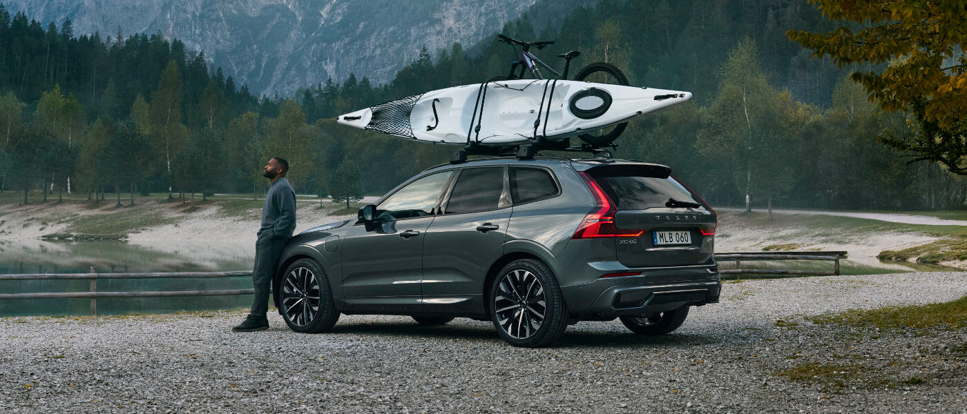 2026 Volvo XC60 Plug-in Hybrid Exterior With Kayak Near Lake