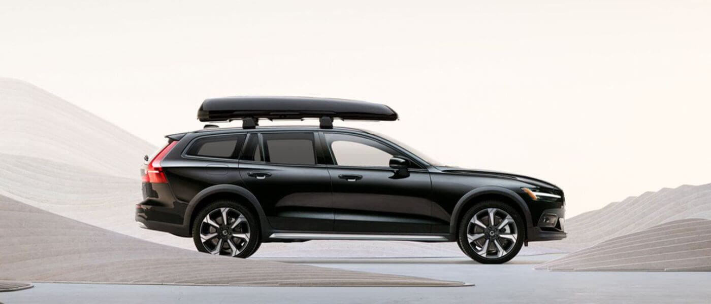 2025 Volvo V60 Cross Country Exterior Parked In Decorative Dunes With Car Carrier