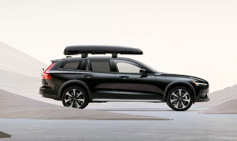 2026 Volvo V60 Cross Country Exterior Parked In Decorative Dunes With Cartop Carrier
