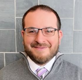 Staff member Brian Cox from ID_6e65c4