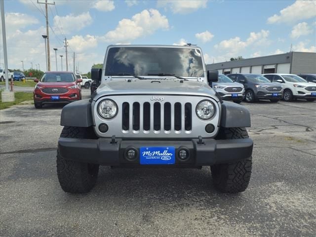 Used 2014 Jeep Wrangler Sport with VIN 1C4AJWAG0EL186127 for sale in Council Bluffs, IA