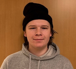 Staff member Wrigley Holland from ID_ad561fae2870