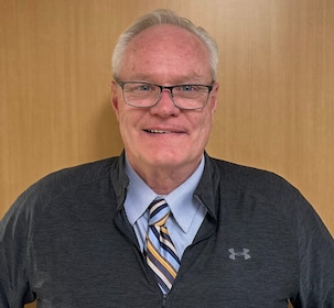 Staff member Ronald Archer from ID_7bd50c14ba12