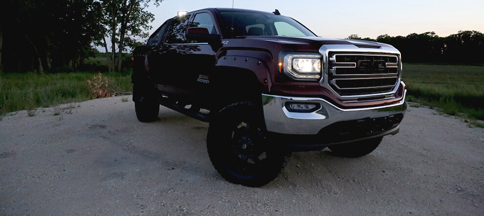 Lifted Sierra with Blackout Emblems.jpg