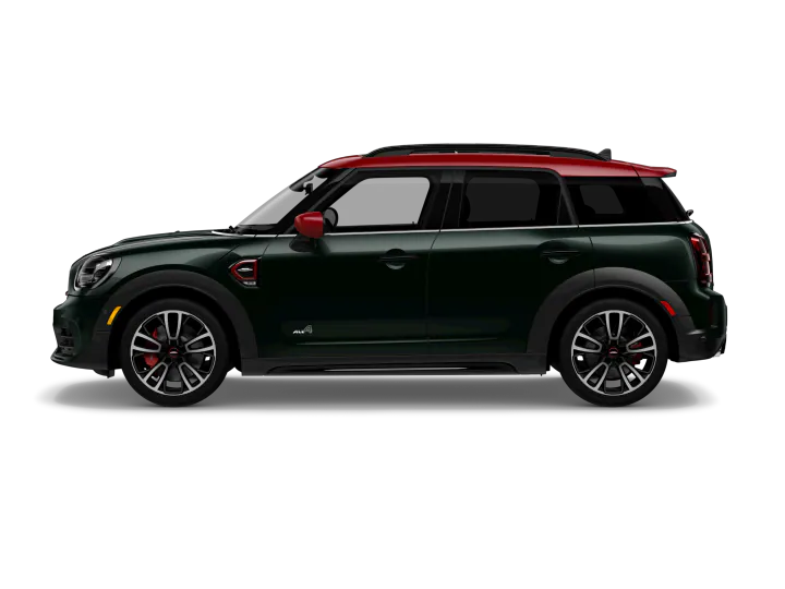 Side view of a dark green MINI Countryman on a white background.