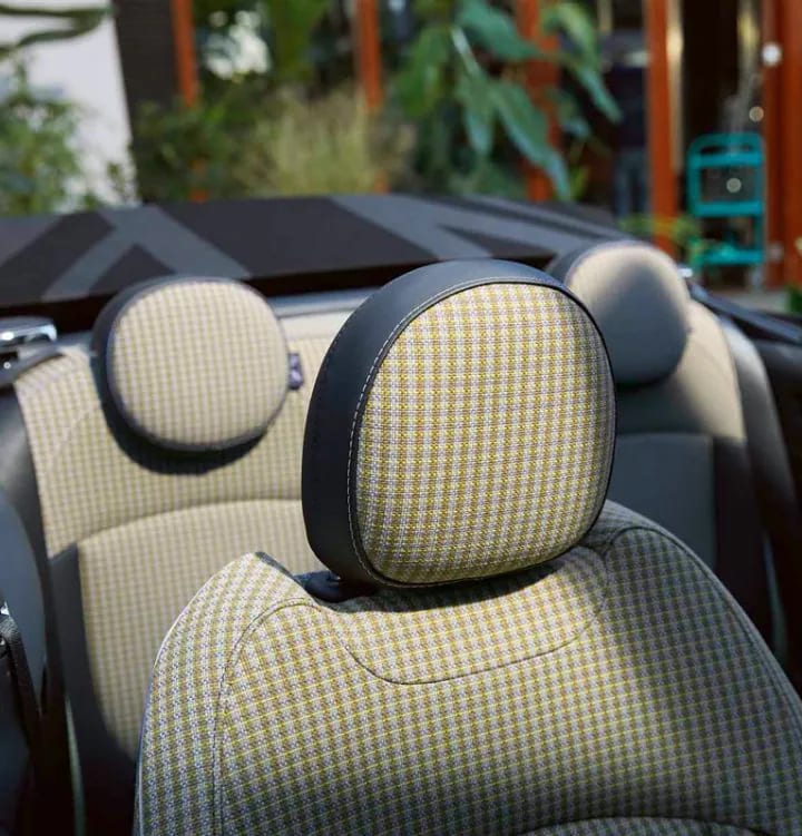 A closeup off the passenger and backseat upholstery of the MINI Convertible.