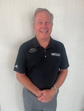 Staff member Jack Medlin Jr.  from ID_3a135e