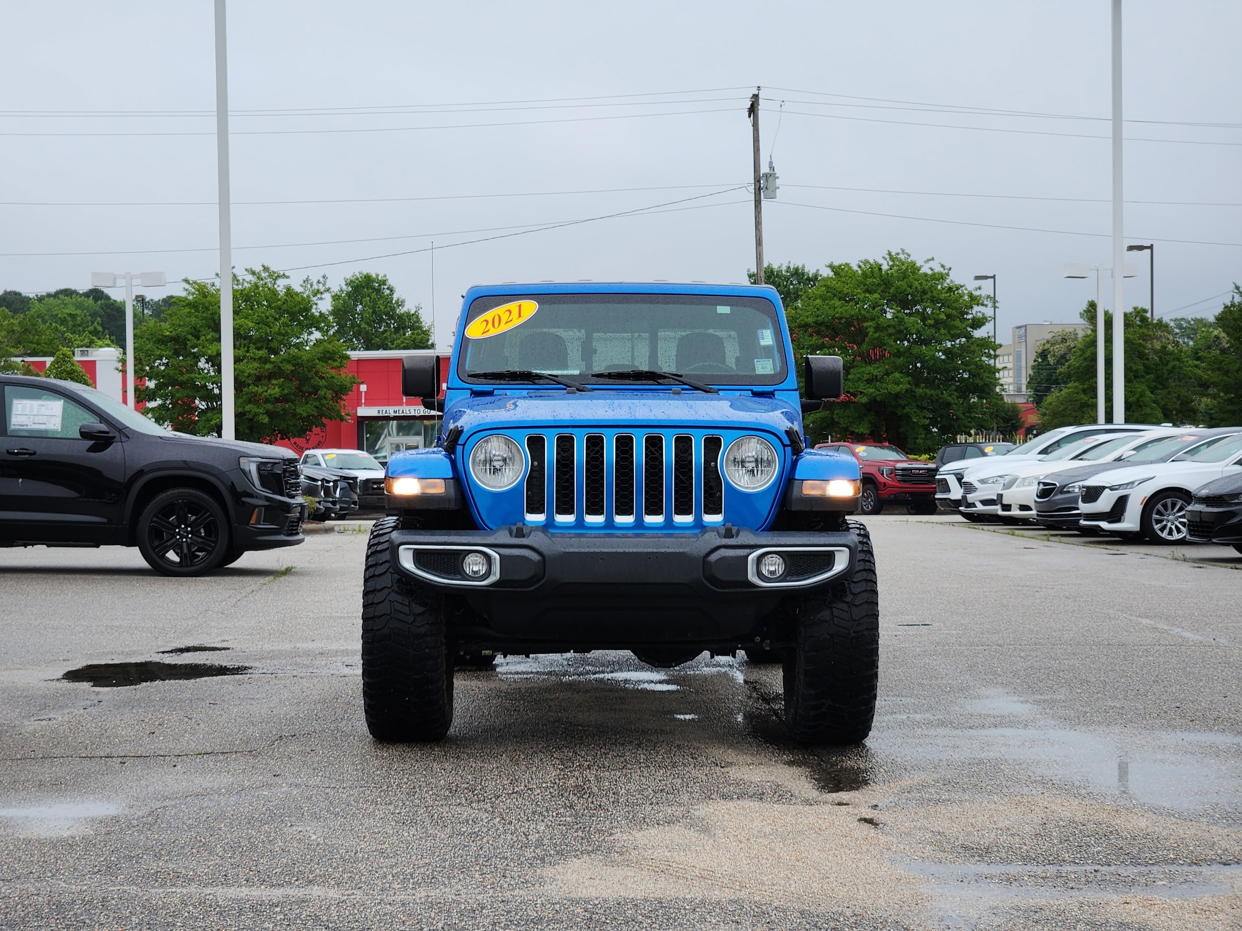 Used 2021 Jeep Gladiator Overland with VIN 1C6JJTFM0ML512317 for sale in Wilson, NC