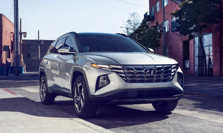 2023 Hyundai Tucson exterior driving on urban street