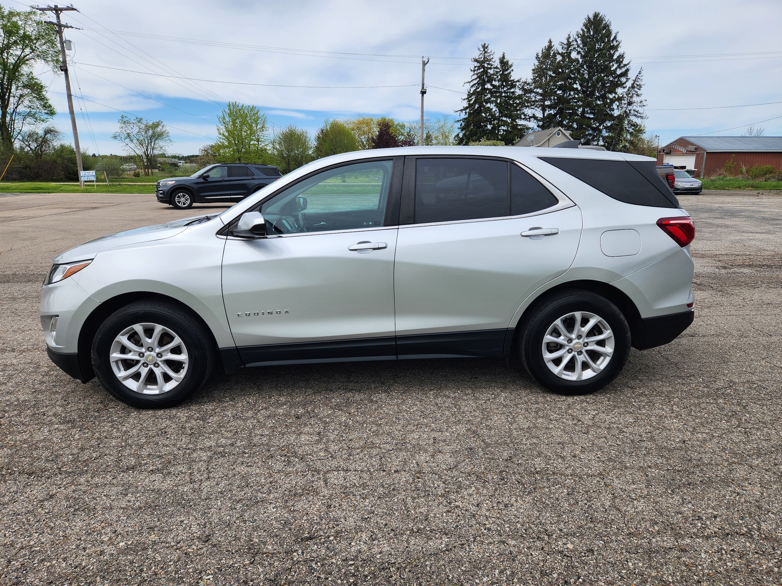 Used 2021 Chevrolet Equinox LT with VIN 3GNAXKEV5MS114971 for sale in Chesaning, MI