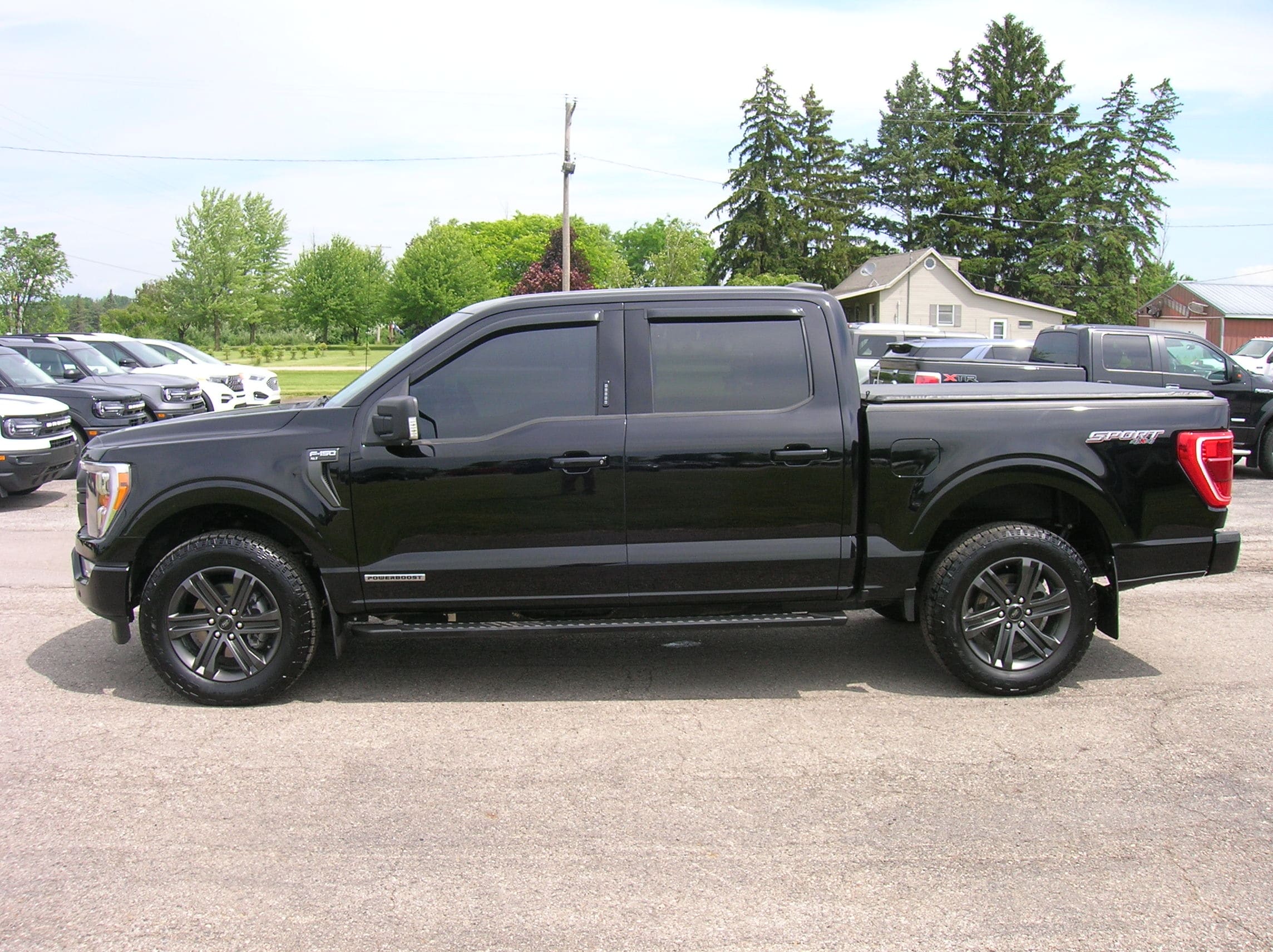 Used 2021 Ford F-150 XLT with VIN 1FTFW1ED5MFA89559 for sale in Chesaning, MI